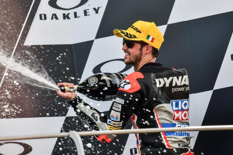 tom luthi racing podium champagne